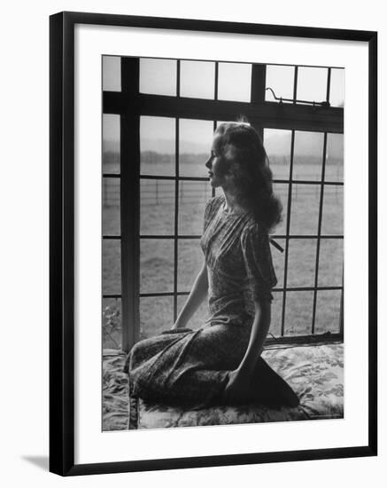 Actress Peggy Cummins Looking Out of a Window-Bob Landry-Framed Premium Photographic Print
