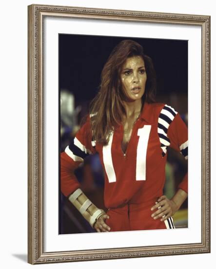 Actress Raquel Welch in Uniform During Filming of Motion Picture "The Kansas City Bomber"-Bill Eppridge-Framed Premium Photographic Print