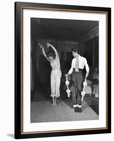 Actress Rita Hayworth, Taking Bullfighting Lessons from Fernando Lopez-Peter Stackpole-Framed Premium Photographic Print