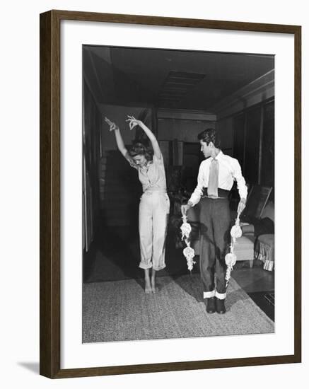 Actress Rita Hayworth, Taking Bullfighting Lessons from Fernando Lopez-Peter Stackpole-Framed Premium Photographic Print