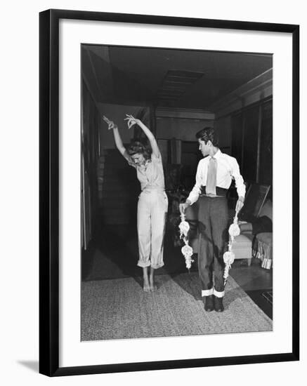 Actress Rita Hayworth, Taking Bullfighting Lessons from Fernando Lopez-Peter Stackpole-Framed Premium Photographic Print