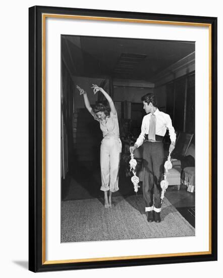 Actress Rita Hayworth, Taking Bullfighting Lessons from Fernando Lopez-Peter Stackpole-Framed Premium Photographic Print