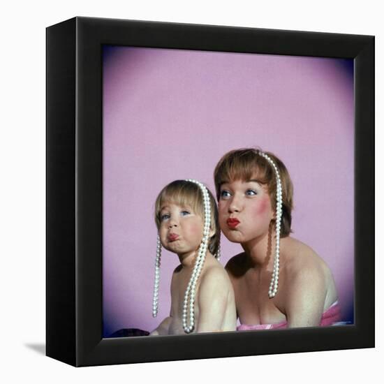 Actress Shirley MacLaine and Daughter Sachi Parker Pouting with String of Pearls on Their Heads-Allan Grant-Framed Premier Image Canvas