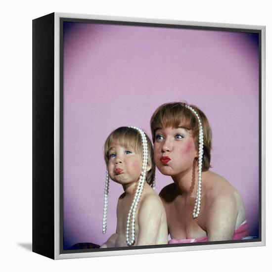 Actress Shirley MacLaine and Daughter Sachi Parker Pouting with String of Pearls on Their Heads-Allan Grant-Framed Premier Image Canvas