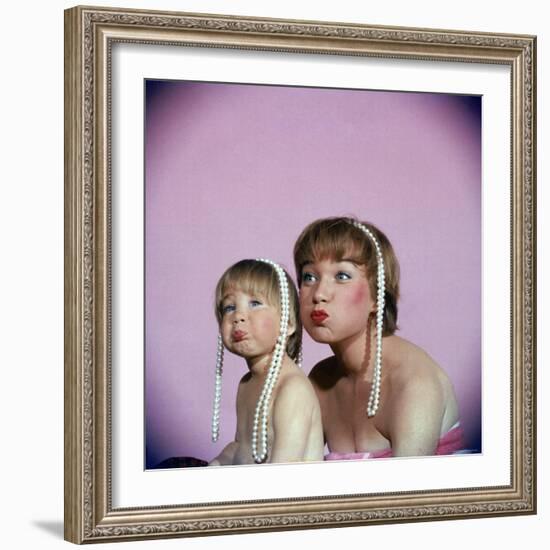 Actress Shirley MacLaine and Daughter Sachi Parker Pouting with String of Pearls on Their Heads-Allan Grant-Framed Premium Photographic Print