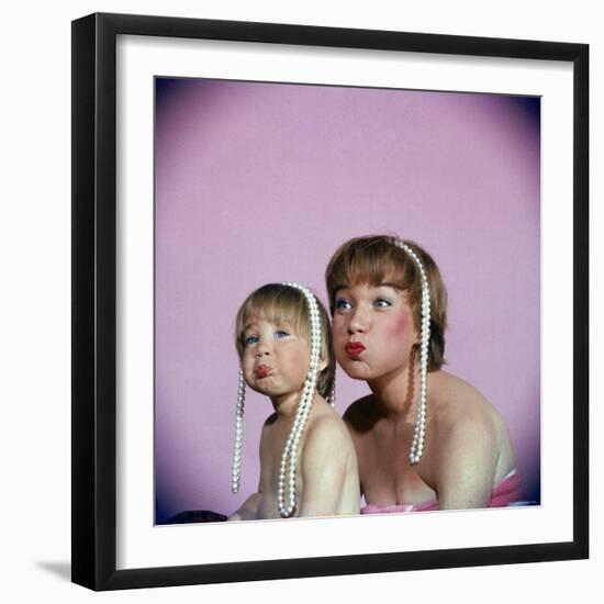 Actress Shirley MacLaine and Daughter Sachi Parker Pouting with String of Pearls on Their Heads-Allan Grant-Framed Premium Photographic Print