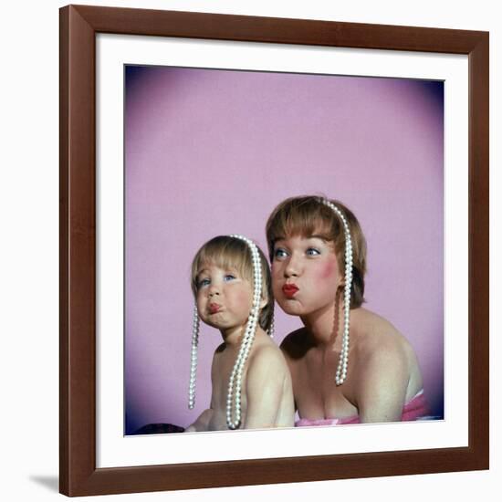 Actress Shirley MacLaine and Daughter Sachi Parker Pouting with String of Pearls on Their Heads-Allan Grant-Framed Premium Photographic Print