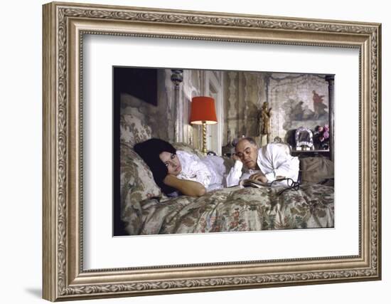 Actress Sophia Loren and Husband Carlo Ponti Lying Across a Bed Together-Alfred Eisenstaedt-Framed Photographic Print