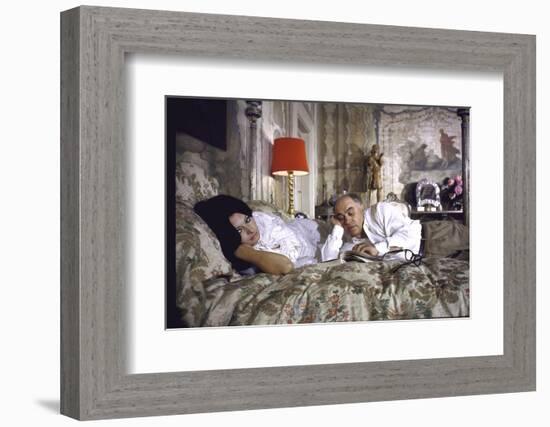 Actress Sophia Loren and Husband Carlo Ponti Lying Across a Bed Together-Alfred Eisenstaedt-Framed Photographic Print