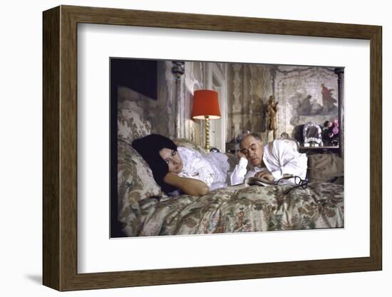 Actress Sophia Loren and Husband Carlo Ponti Lying Across a Bed Together-Alfred Eisenstaedt-Framed Photographic Print