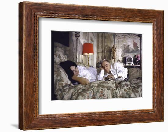 Actress Sophia Loren and Husband Carlo Ponti Lying Across a Bed Together-Alfred Eisenstaedt-Framed Photographic Print