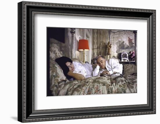 Actress Sophia Loren and Husband Carlo Ponti Lying Across a Bed Together-Alfred Eisenstaedt-Framed Photographic Print