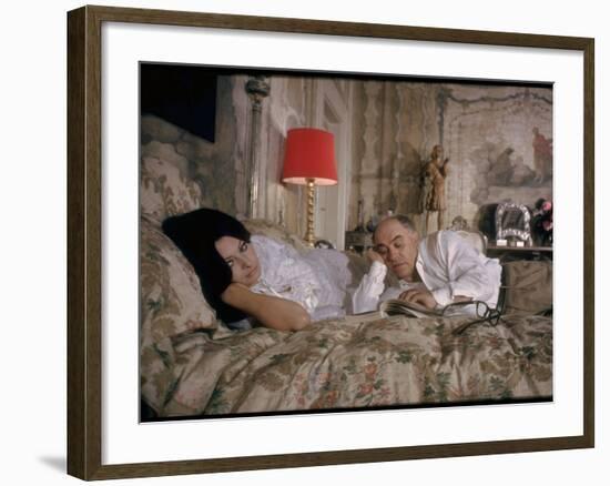 Actress Sophia Loren and Husband, Producer Carlo Ponti, Lying across a Bed Together-Alfred Eisenstaedt-Framed Premium Photographic Print