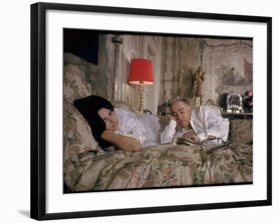 Actress Sophia Loren and Husband, Producer Carlo Ponti, Lying across a Bed Together-Alfred Eisenstaedt-Framed Premium Photographic Print