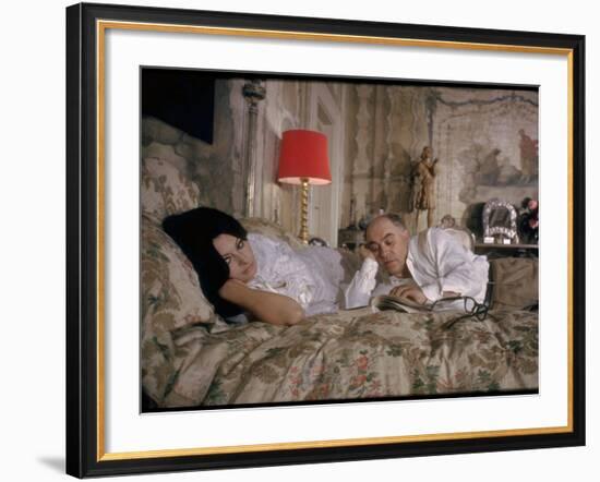 Actress Sophia Loren and Husband, Producer Carlo Ponti, Lying across a Bed Together-Alfred Eisenstaedt-Framed Premium Photographic Print