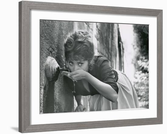 Actress Sophia Loren Drinking Water from Spigot During the Filming of Madame Sans Gene-Alfred Eisenstaedt-Framed Premium Photographic Print