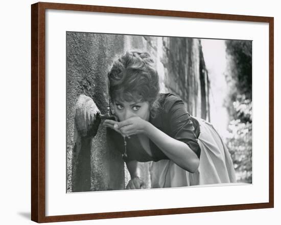 Actress Sophia Loren Drinking Water from Spigot During the Filming of Madame Sans Gene-Alfred Eisenstaedt-Framed Premium Photographic Print