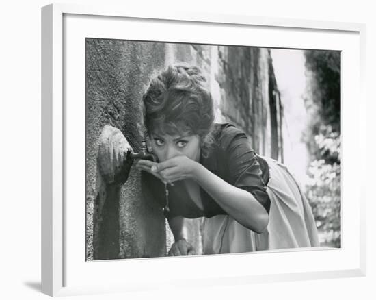 Actress Sophia Loren Drinking Water from Spigot During the Filming of Madame Sans Gene-Alfred Eisenstaedt-Framed Premium Photographic Print