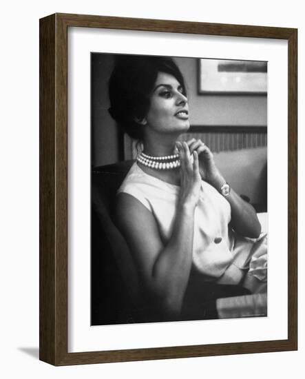 Actress Sophia Loren Fingering Her Pearl Necklace-Alfred Eisenstaedt-Framed Premium Photographic Print