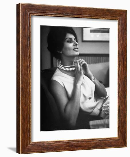 Actress Sophia Loren Fingering Her Pearl Necklace-Alfred Eisenstaedt-Framed Premium Photographic Print