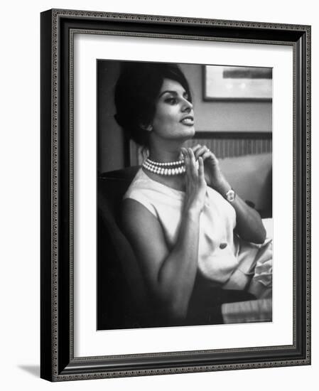 Actress Sophia Loren Fingering Her Pearl Necklace-Alfred Eisenstaedt-Framed Premium Photographic Print