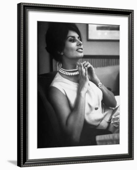 Actress Sophia Loren Fingering Her Pearl Necklace-Alfred Eisenstaedt-Framed Premium Photographic Print