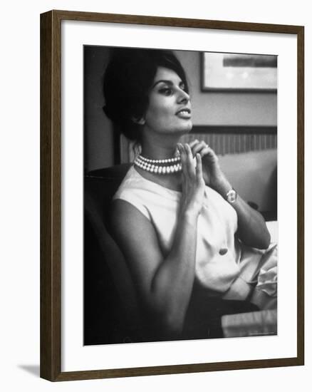 Actress Sophia Loren Fingering Her Pearl Necklace-Alfred Eisenstaedt-Framed Premium Photographic Print