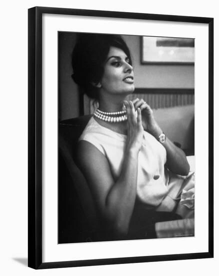 Actress Sophia Loren Fingering Her Pearl Necklace-Alfred Eisenstaedt-Framed Premium Photographic Print