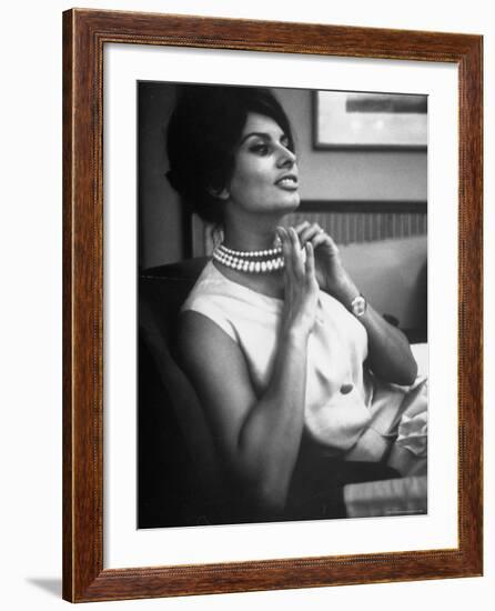 Actress Sophia Loren Fingering Her Pearl Necklace-Alfred Eisenstaedt-Framed Premium Photographic Print