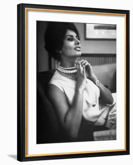 Actress Sophia Loren Fingering Her Pearl Necklace-Alfred Eisenstaedt-Framed Premium Photographic Print