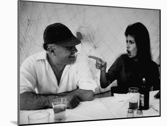 Actress Sophia Loren Humorously Berating Husband, Carlo Ponti, While Dining in Restaurant-Alfred Eisenstaedt-Mounted Premium Photographic Print