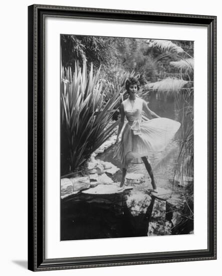 Actress Sophia Loren Walking Through Grounds of Hotel-null-Framed Premium Photographic Print