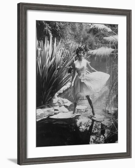 Actress Sophia Loren Walking Through Grounds of Hotel-null-Framed Premium Photographic Print