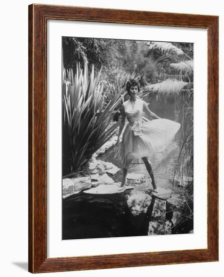 Actress Sophia Loren Walking Through Grounds of Hotel-null-Framed Premium Photographic Print