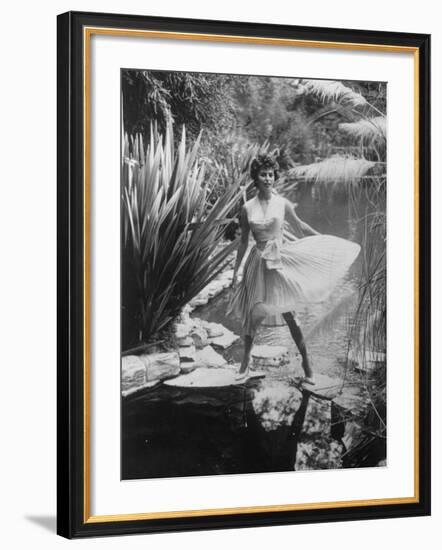 Actress Sophia Loren Walking Through Grounds of Hotel-null-Framed Premium Photographic Print