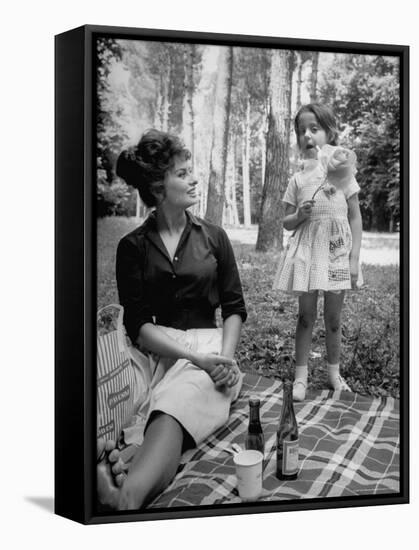 Actress Sophia Loren with Girl Holding a Flower During Picnic While Filming "Madame Sans Gene"-Alfred Eisenstaedt-Framed Premier Image Canvas