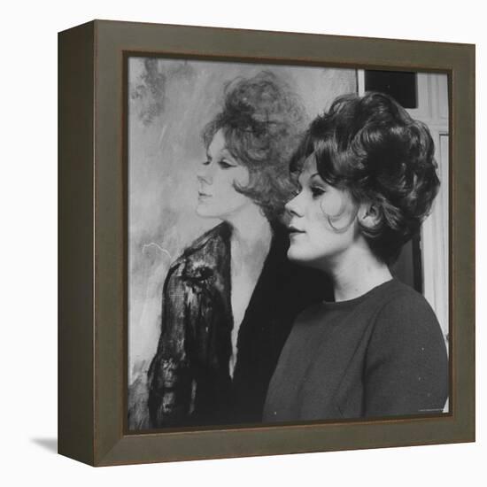 Actress, Tammy Grimes, Posing in Front of Portrait by Rene Bouche-Dmitri Kessel-Framed Premier Image Canvas