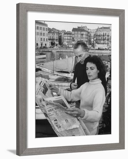 Actress Yvonne Mitchell and Husband Derek Monsey, Reading London Paper During Visit to Cannes-Loomis Dean-Framed Premium Photographic Print