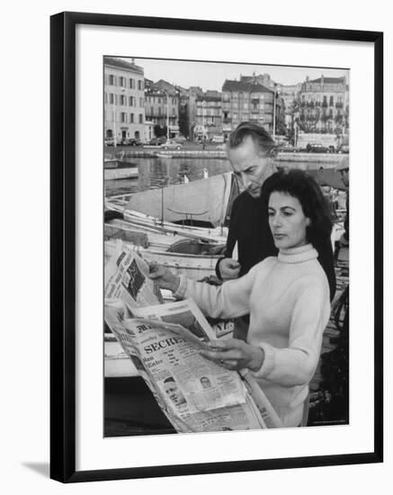 Actress Yvonne Mitchell and Husband Derek Monsey, Reading London Paper During Visit to Cannes-Loomis Dean-Framed Premium Photographic Print