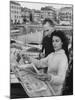 Actress Yvonne Mitchell and Husband Derek Monsey, Reading London Paper During Visit to Cannes-Loomis Dean-Mounted Premium Photographic Print