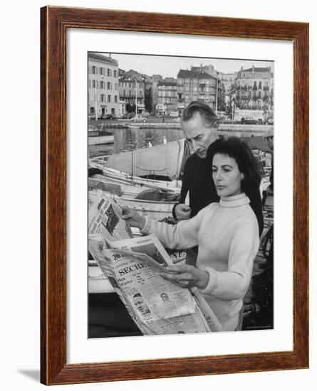 Actress Yvonne Mitchell and Husband Derek Monsey, Reading London Paper During Visit to Cannes-Loomis Dean-Framed Premium Photographic Print