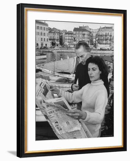 Actress Yvonne Mitchell and Husband Derek Monsey, Reading London Paper During Visit to Cannes-Loomis Dean-Framed Premium Photographic Print