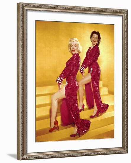 Actresses Marilyn Monroe and Jane Russell Wearing Gowns Designed by Travilla Pose for Publicity-Ed Clark-Framed Premium Photographic Print