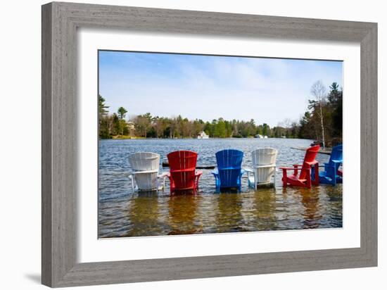 Adirondack Chairs Partially Submerged in the Lake Muskoka, Ontario, Canada-null-Framed Photographic Print