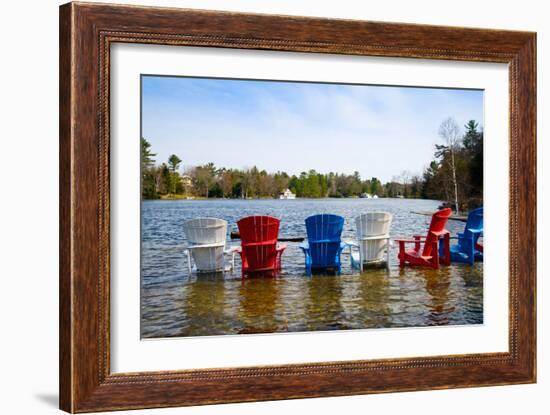 Adirondack Chairs Partially Submerged in the Lake Muskoka, Ontario, Canada-null-Framed Photographic Print