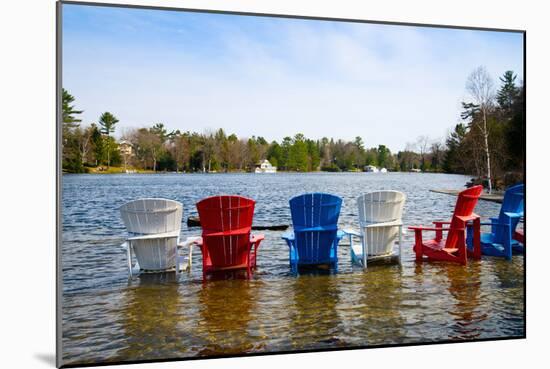 Adirondack Chairs Partially Submerged in the Lake Muskoka, Ontario, Canada-null-Mounted Photographic Print