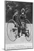 Adolphe Clement and His Wife on a Tricycle-null-Mounted Photographic Print
