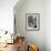 Adorable Baby Brushing Teeth While Sitting in Sink-null-Framed Photographic Print displayed on a wall