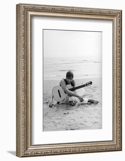 Adriano Celentano on the Sea Shore-Marisa Rastellini-Framed Photographic Print