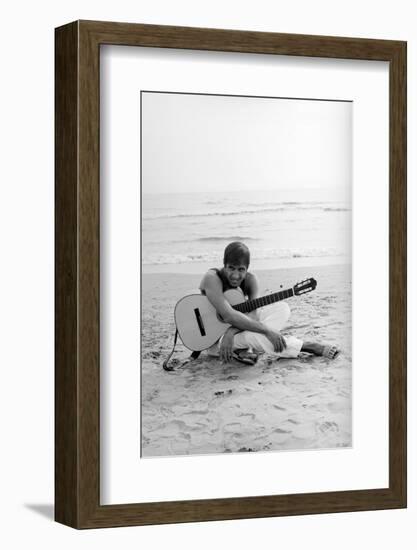 Adriano Celentano on the Sea Shore-Marisa Rastellini-Framed Photographic Print